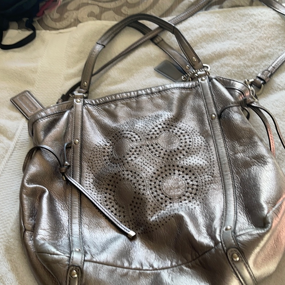 Authentic coach metallic leather purse